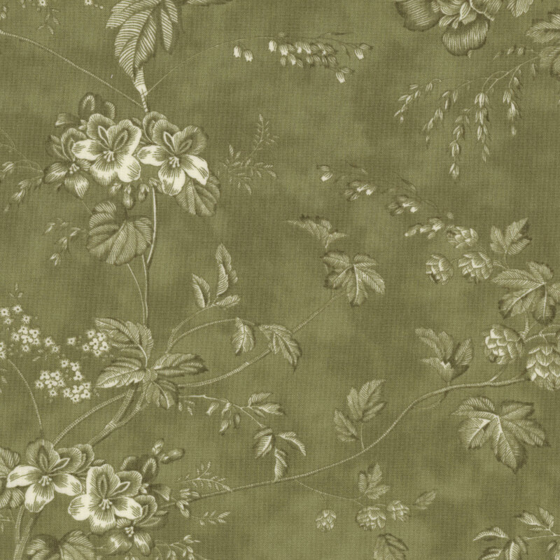 Patterned fabric featuring floral designs in white and light green against an olive green background.