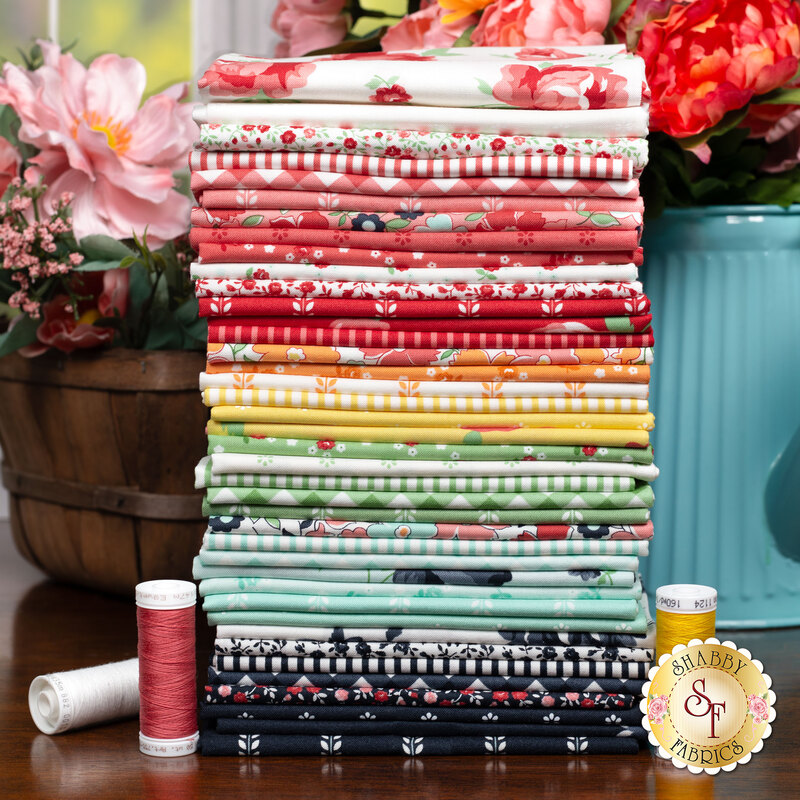 A stack of colorful fabrics in the Summertime collection