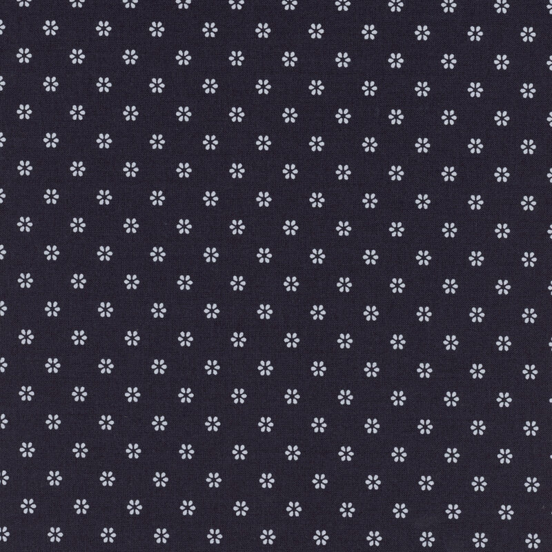 Navy fabric with a repeating pattern of small, subtle flower shapes.