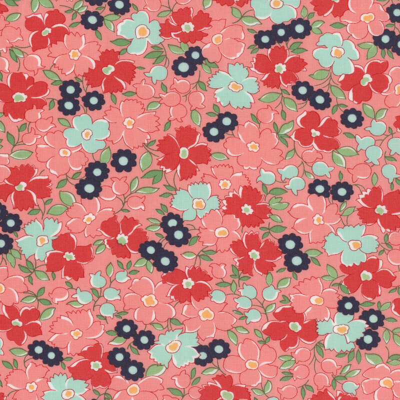 Packed florals in red, pink, and blue on a pink background.