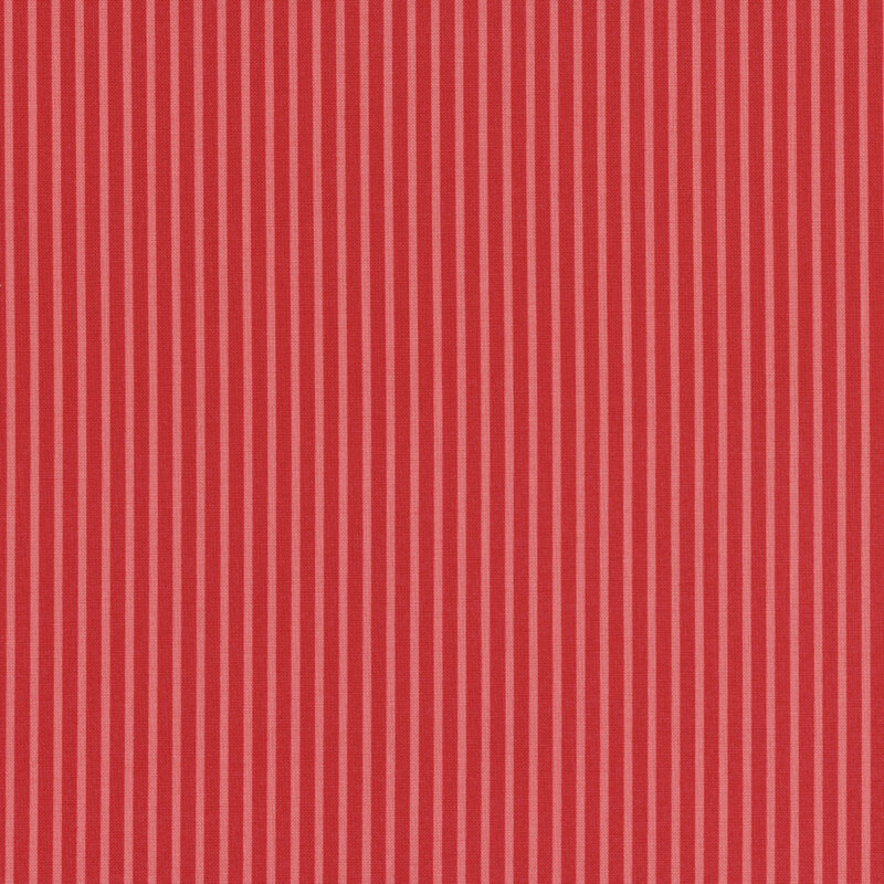 red and pink thinly striped fabric