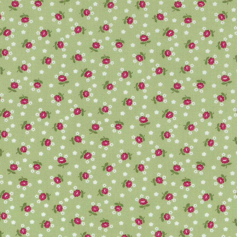 Light green fabric scattered with dark pink roses and tiny white floral motifs