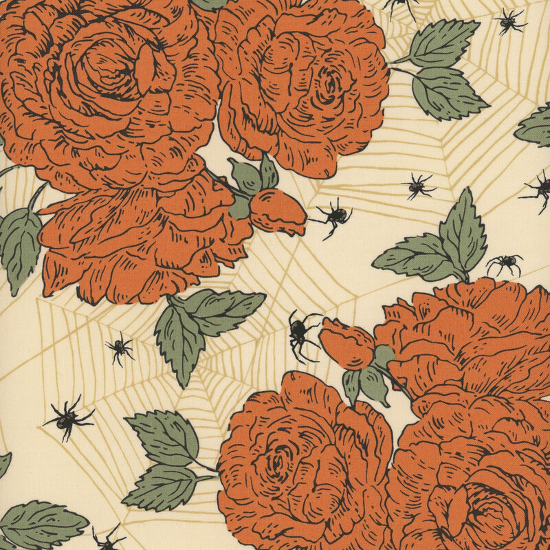 Cream fabric with orange flowers and intricate tonal spiderwebs stretched across the design.