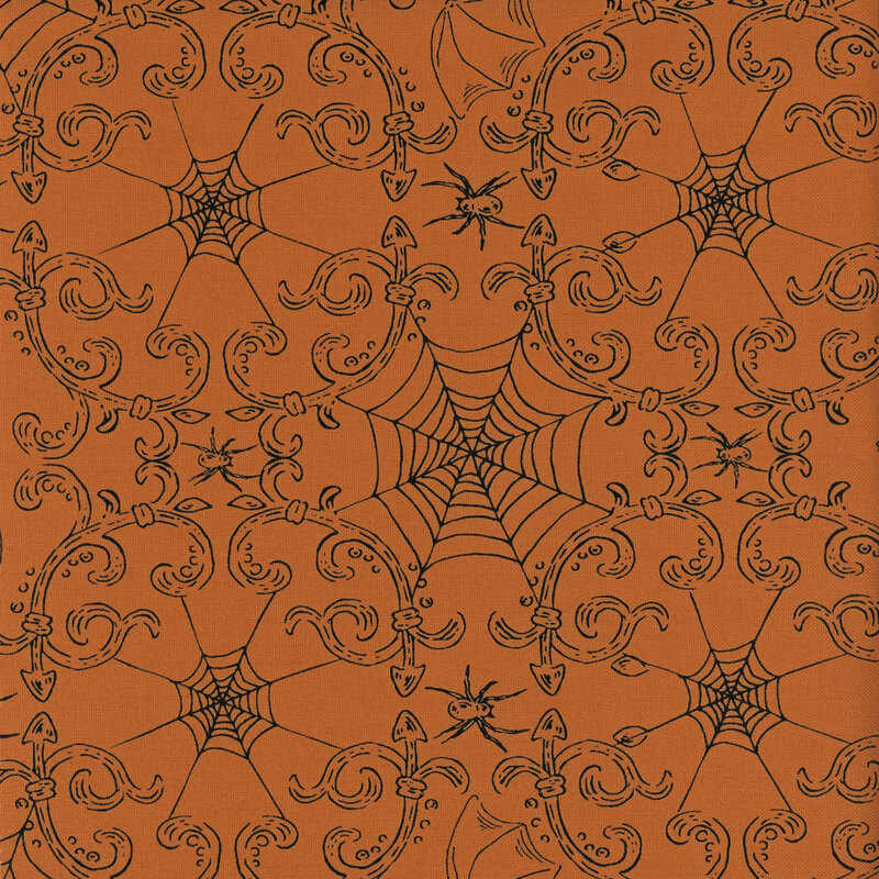 Orange fabric with connected intricate spiderwebbing and ornate swirls with bats and spiders hidden in the imagery.