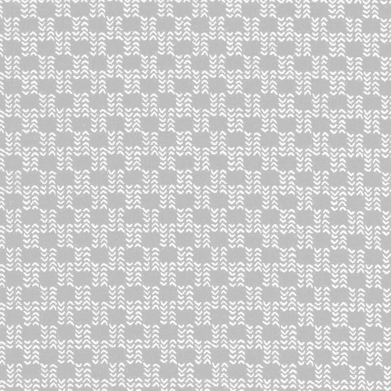 Repeating directional arrow checker-pattern design in white on a muted gray background.