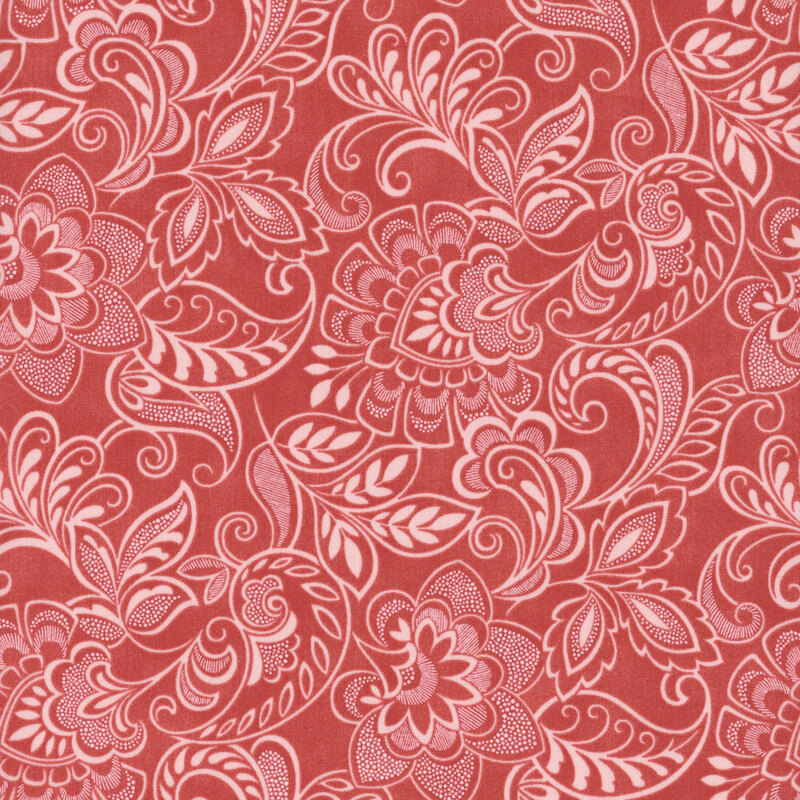 Floral fabric in shades of coral and white, featuring swirls, leaves, and intricate blooms.