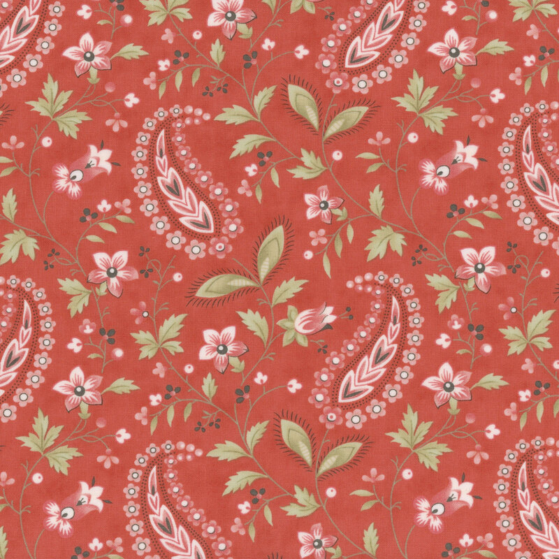 Red floral pattern with paisley motifs on a coral background, featuring pink flowers and green leaves.