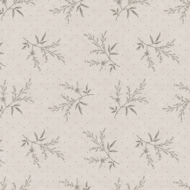 Gray fabric with tonal dots and leaves.