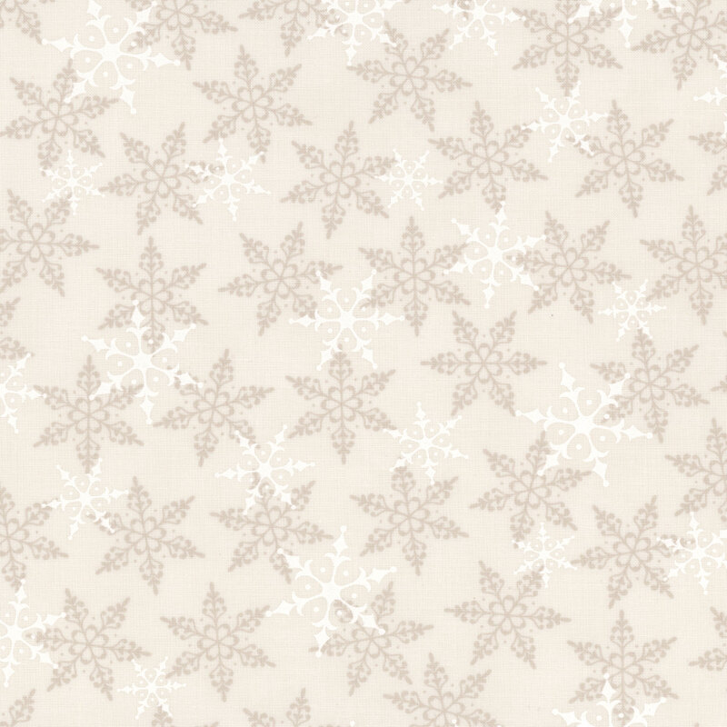 Cream fabric with white and tonal snowflakes tossed across the design.