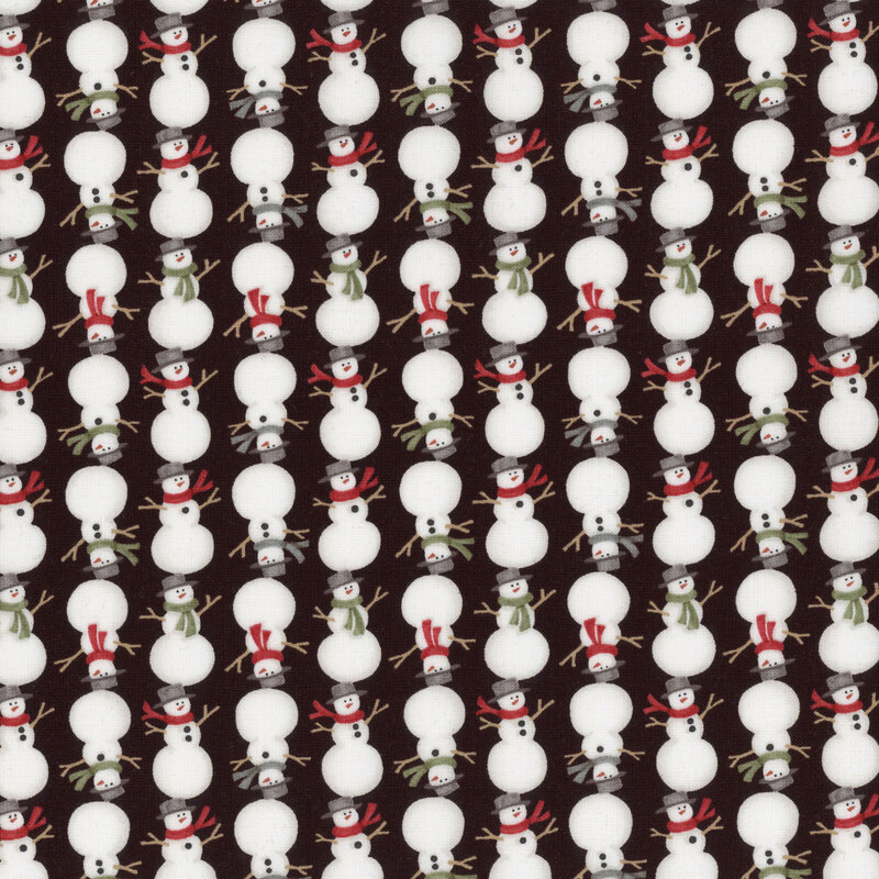 Black fabric with alternating rows of right-side-up and upside-down snowmen in scarves and hats.