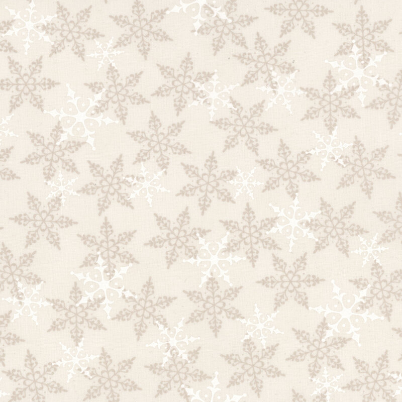 Cream fabric with white and tonal snowflakes tossed across the design.