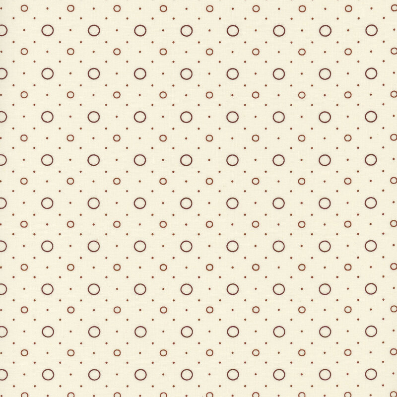 Pattern of cream background with various sizes of black outlined circles and dots.