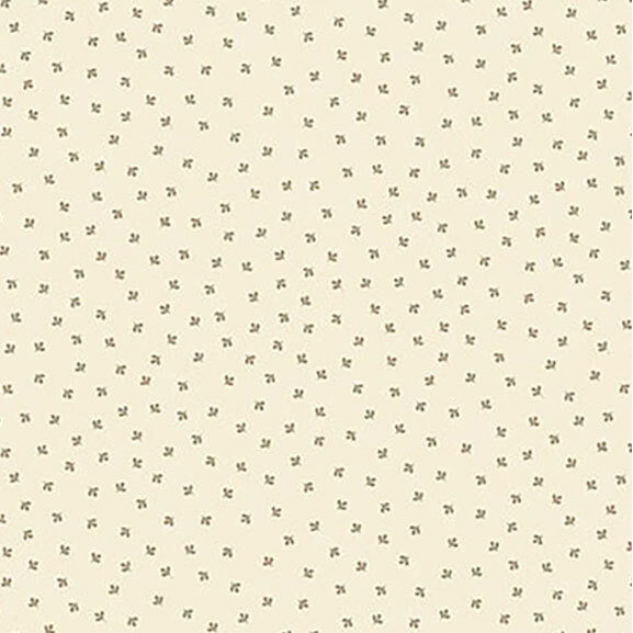 Light beige background featuring a scattered pattern of small green floral motifs.