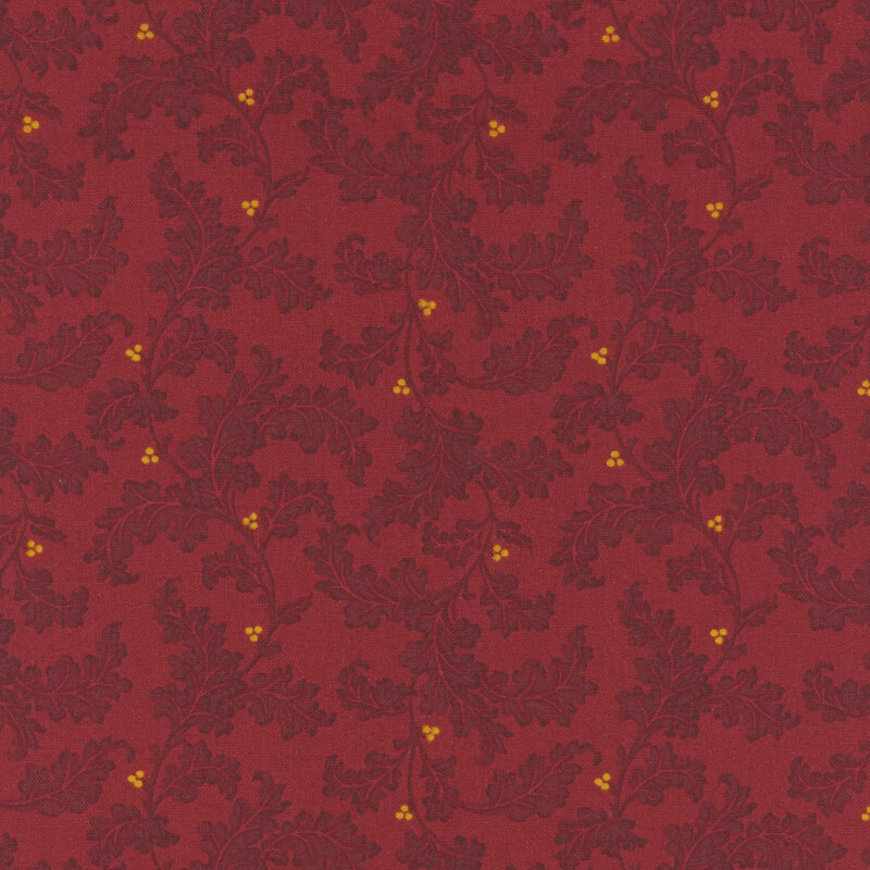 Decorative red fabric featuring embossed dark leaves and small yellow berry-like accents.