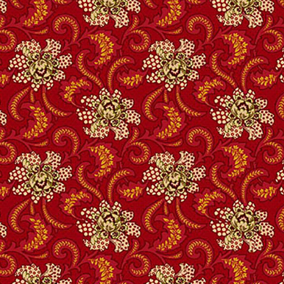 Red fabric with a repeating floral and paisley pattern in gold, cream, and shades of orange.