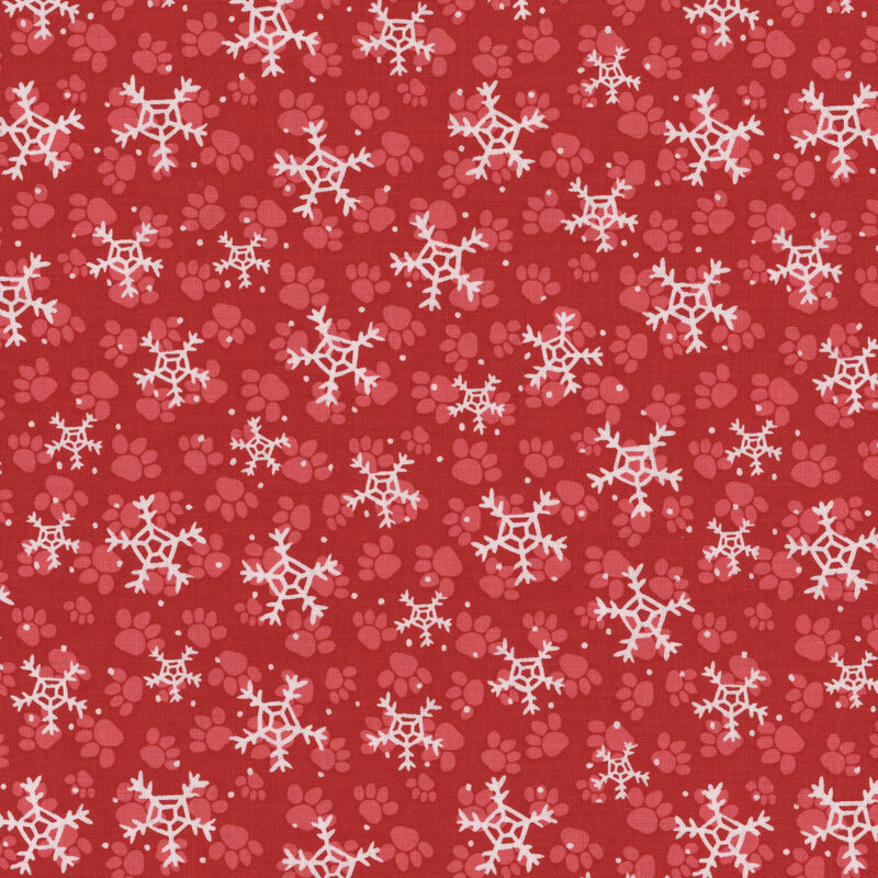 Red fabric with white snowflakes and light red paw prints scattered throughout.