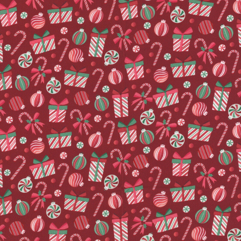 Red background filled with holiday-themed gifts, ornaments, candy canes, and festive sweets.