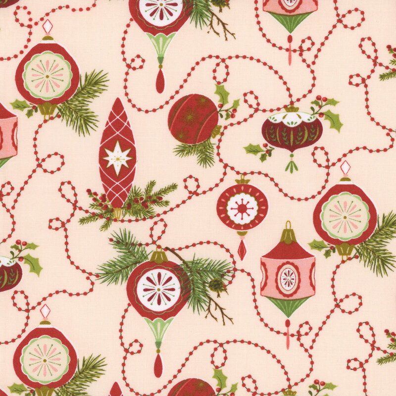 Fabric pattern featuring red and green Christmas ornaments and pine branches on a pink background