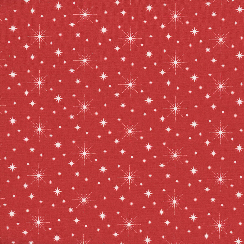 Red fabric with various sized white twinkling stars throughout
