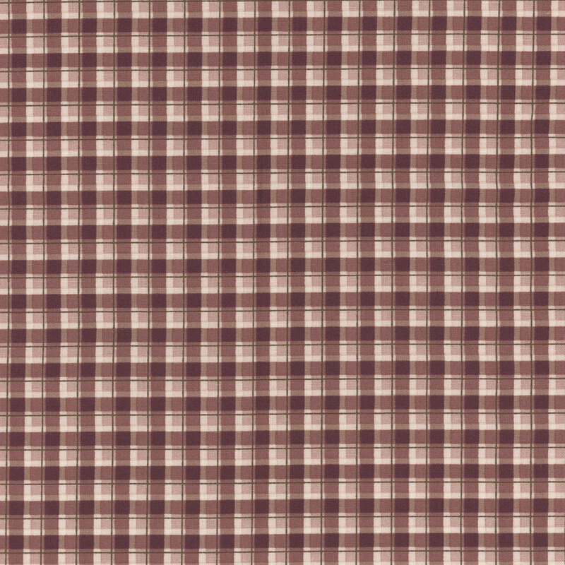 A plum and cream colored plaid fabric
