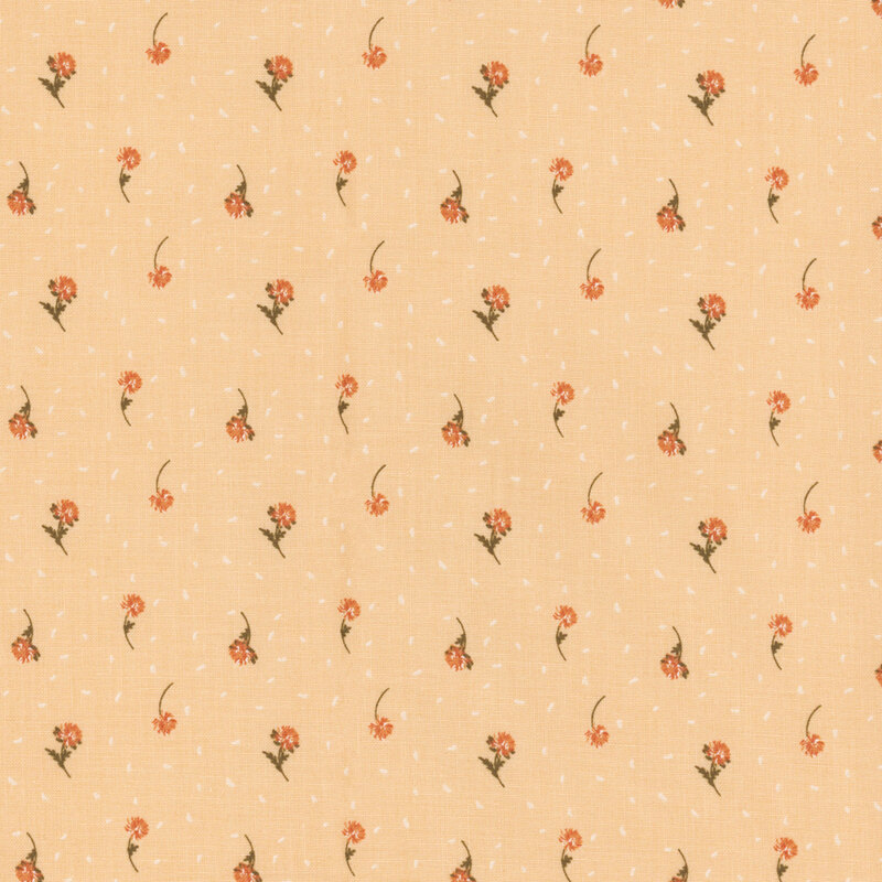 Fabric with a repeating floral pattern with small orange flowers on a soft peach background.