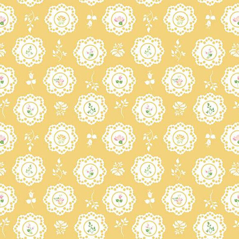 Bright yellow fabric with large white scalloped floral motifs