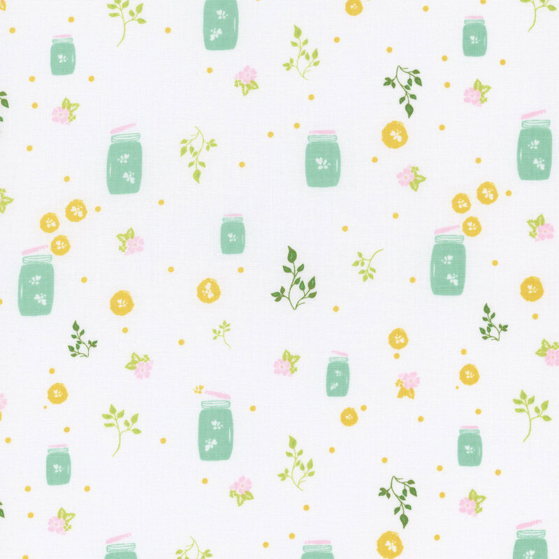 White fabric with small green sprigs, blue jars with fireflies, and small yellow flowers