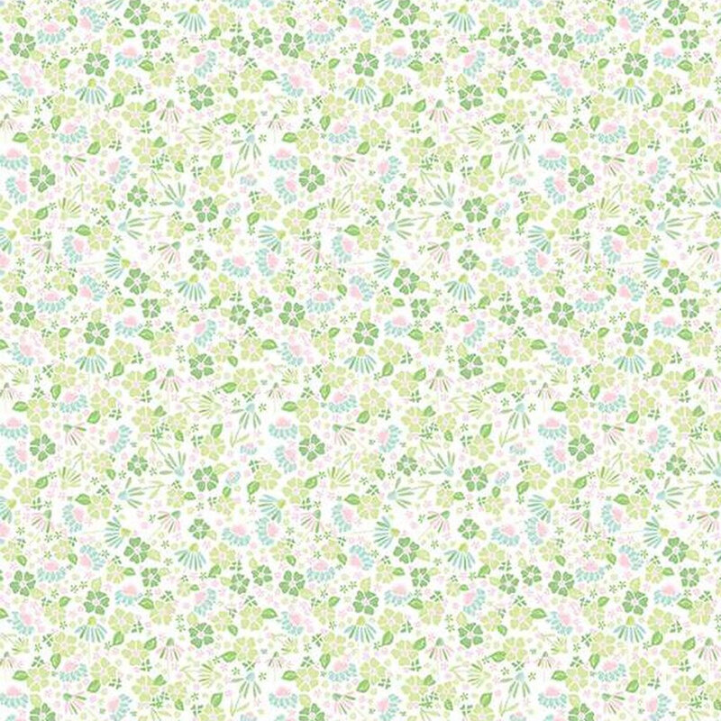 White fabric covered in small, green, scattered florals and leaves