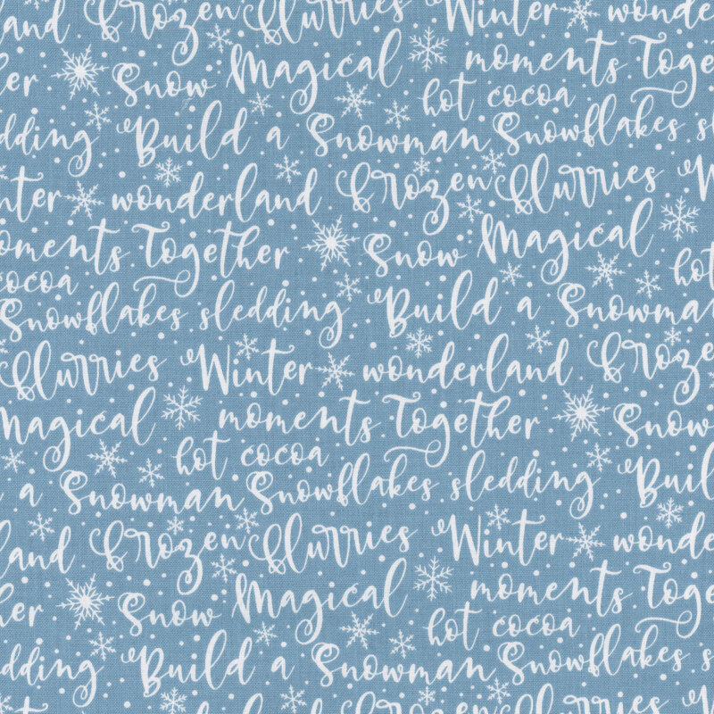 Aqua blue fabric with overlapping white text featuring winter-themed phrases and words.