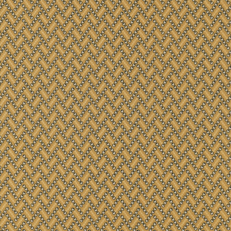 A light tan fabric with dotted zigzag lines made up of abstract shapes.