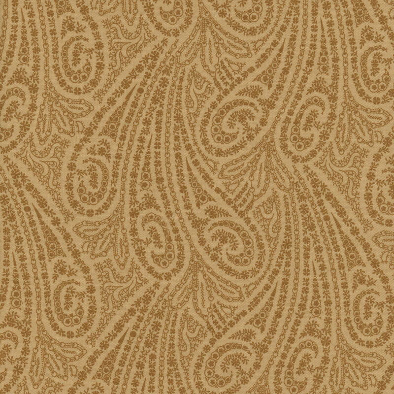 A light tan fabric with large, brown simplified paisley designs.