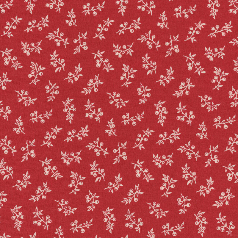 Red fabric with a floral pattern featuring white branches and small berries scattered throughout.
