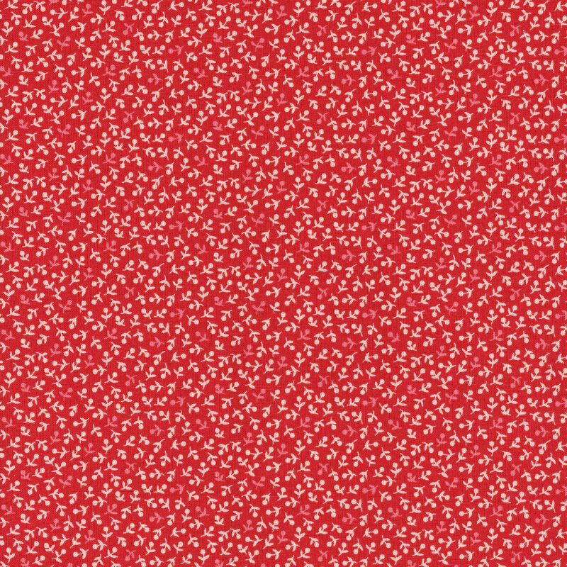 Red fabric patterned with small white and pink flowers.