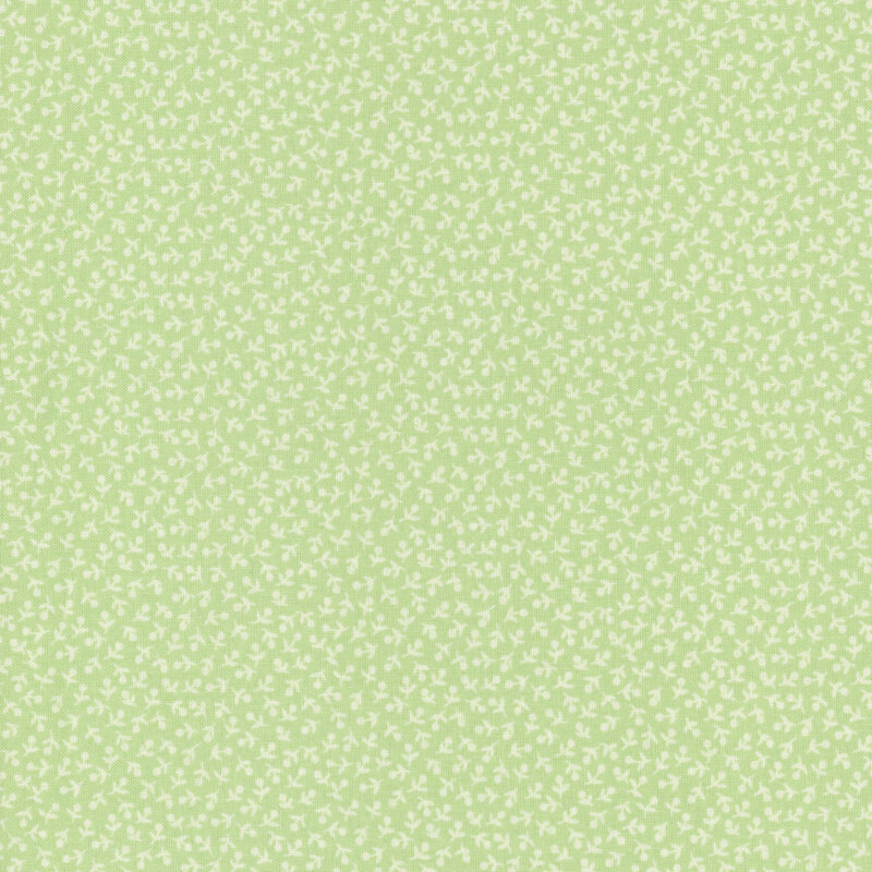 Light green fabric with a delicate white floral pattern.