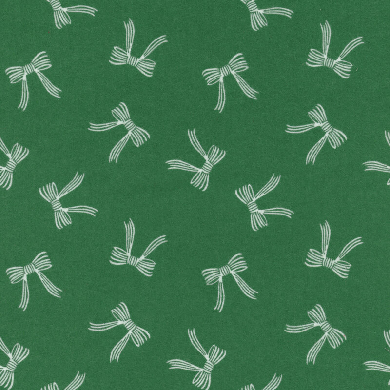 Dark green fabric featuring tossed white Christmas ribbon bows