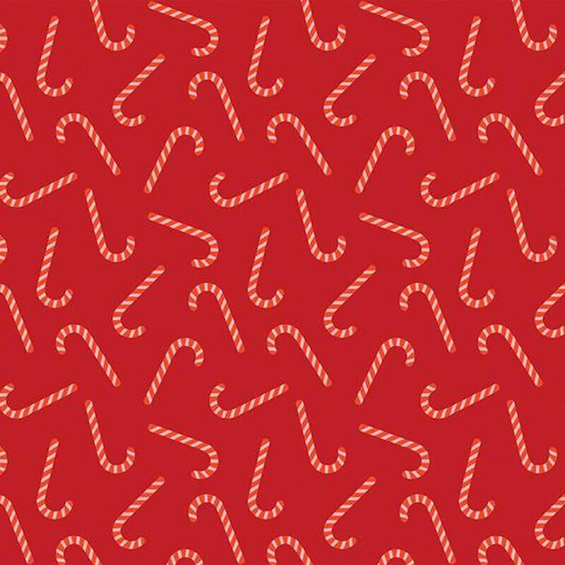 Red fabric featuring tossed red candy canes throughout