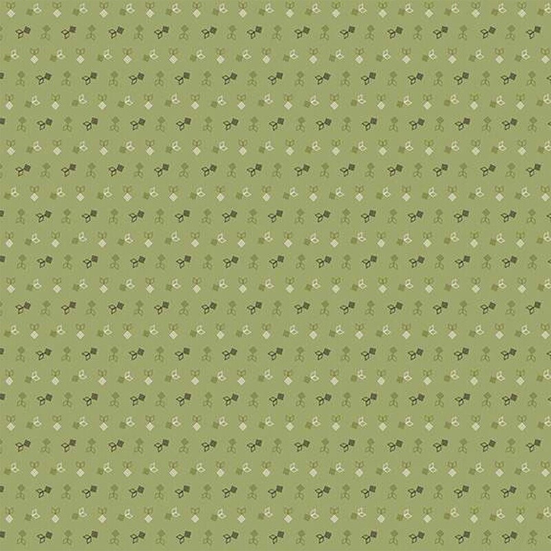 A green background fabric featuring small floral and leaf motifs in a repeating design.