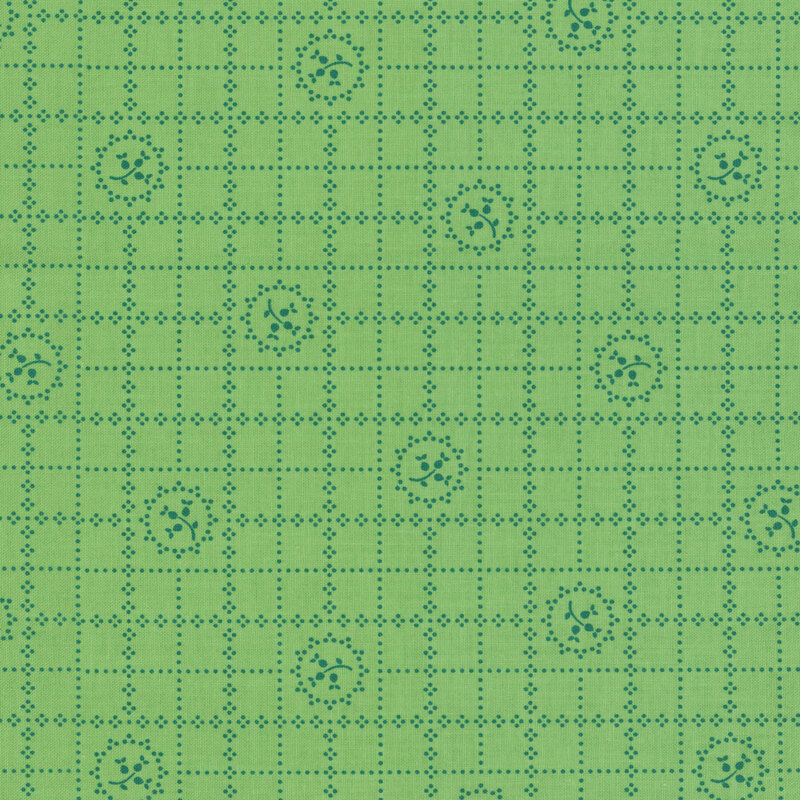 A textured pattern featuring blue floral motifs and a grid like pattern on a light green background.