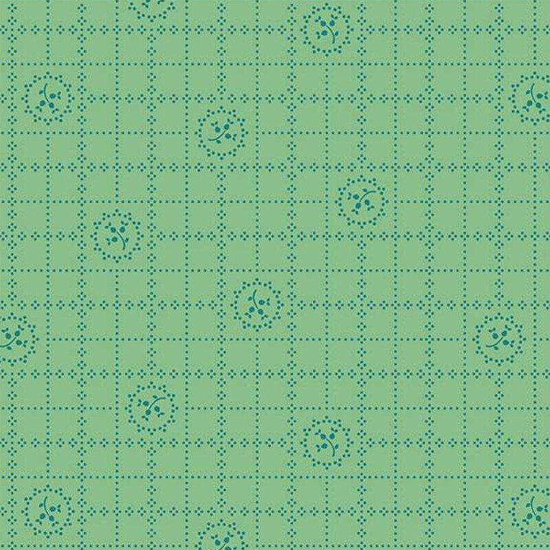 A textured pattern featuring blue floral motifs and a grid like pattern on a light green background.