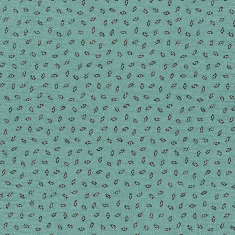 Fabric with a blue background featuring small, repeated ditsy illustrations.