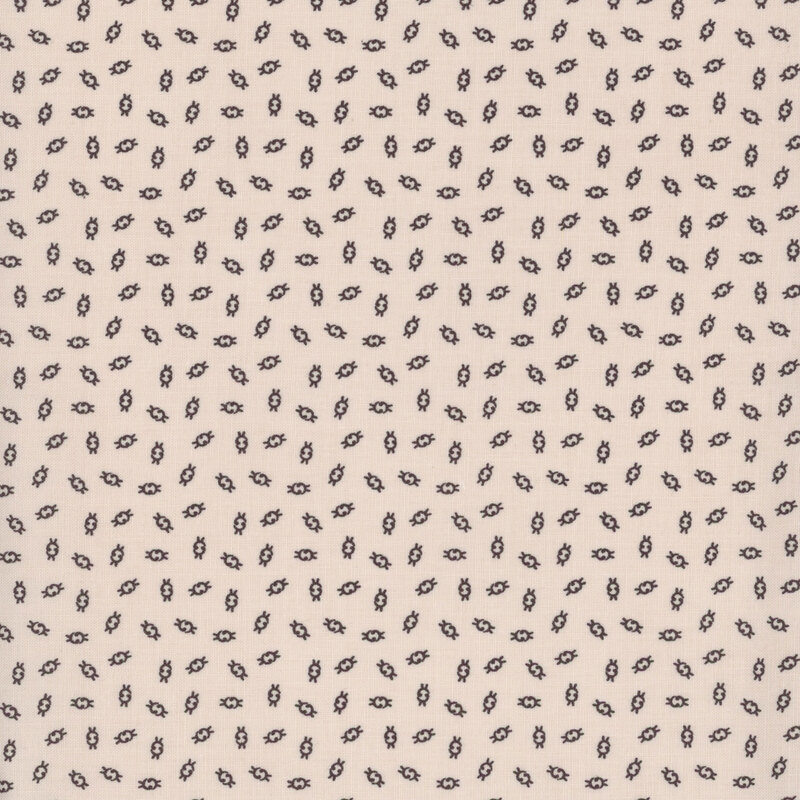 Fabric with a cream background featuring small, repeated ditsy illustrations.
