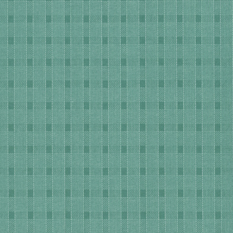 Fabric with a teal plaid design with thin white lines.