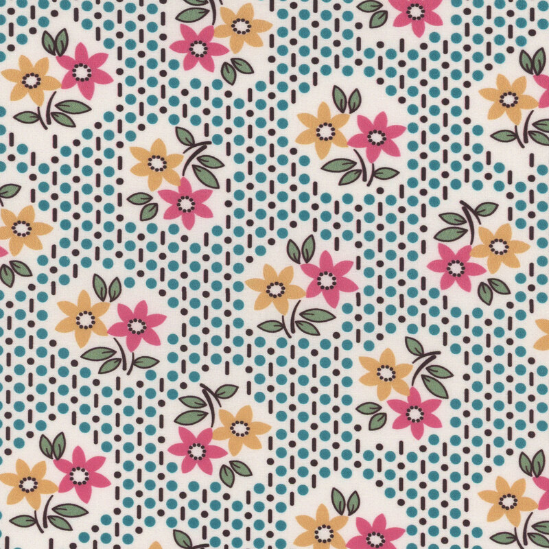 Floral fabric featuring pink, yellow, and blue flowers on a white background with dotted turquoise accents
