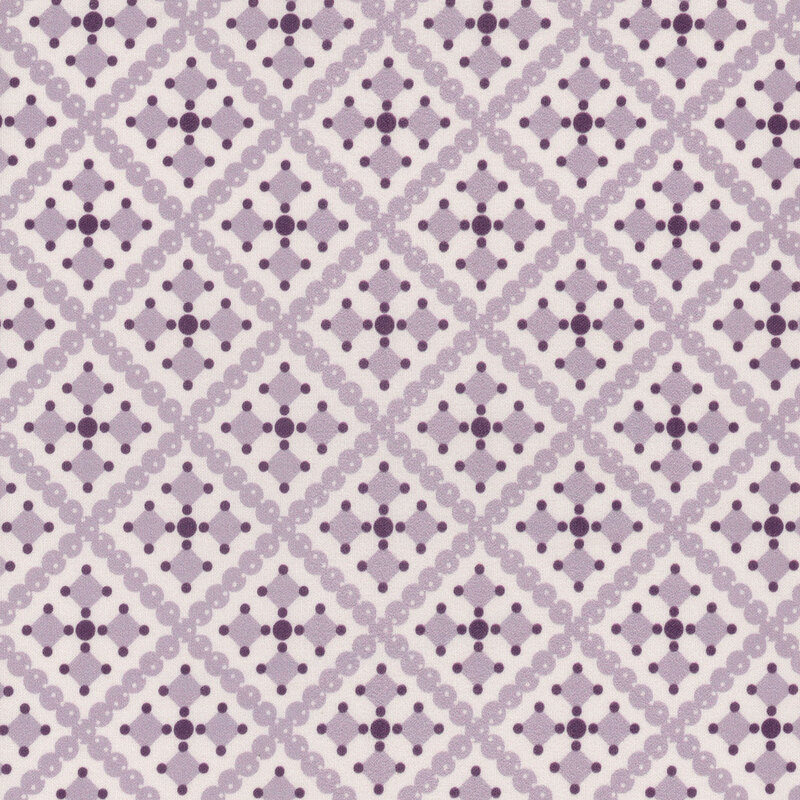 A repeating geometric pattern of diamonds and circles in soft lilac and cream hues.