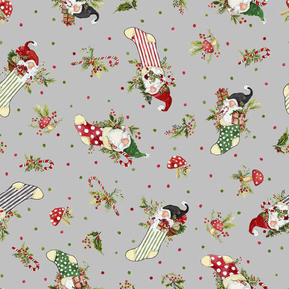 Fabric made of festive socks with gnomes, mushrooms, and holly against a light gray background.