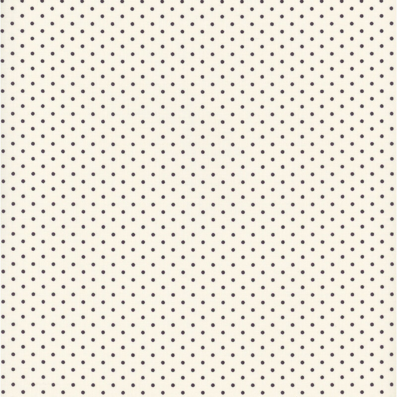 Cream fabric with navy polka dots.