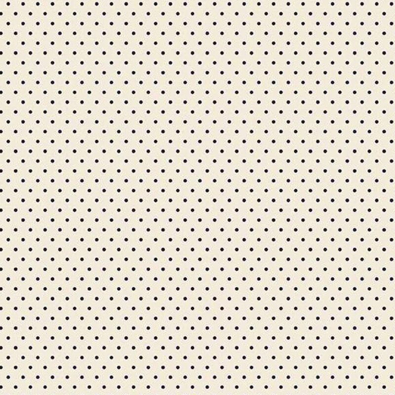 Cream fabric with navy polka dots.