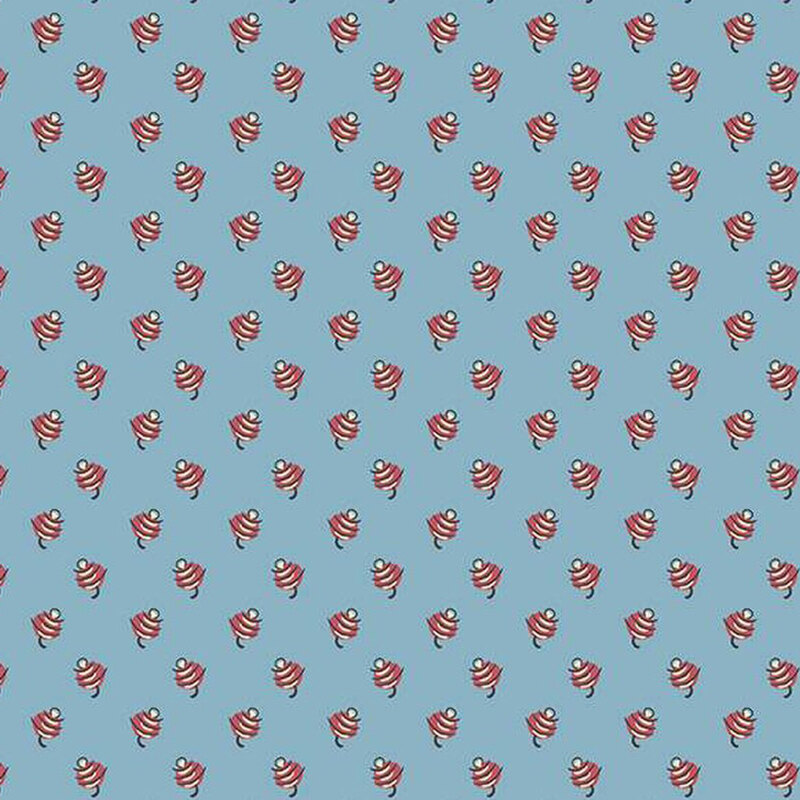 Dusty blue fabric with an abstract red and white calico print.