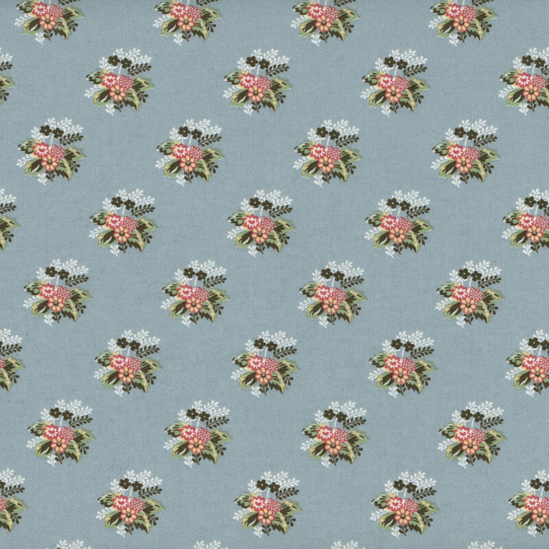 Dusty blue fabric with rows of ornate pink, white, and tonal blue tapestry flowers.