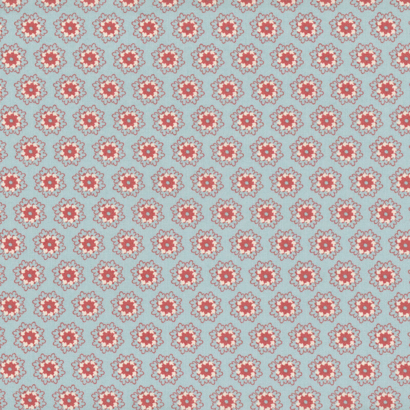 Dusty blue fabric with rows of ornate pink and white flowers.